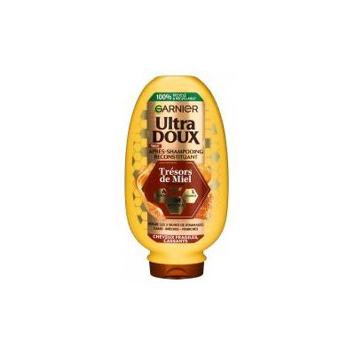 Garnier Ultra Doux Trésors de Miel Après-Shampooing Reconstituant 360 ml - Flacon - Publicité Garnier Ultra Doux Trésors de Miel Après-Shampooing Reconstituant 360 ml - Flacon - Publicité