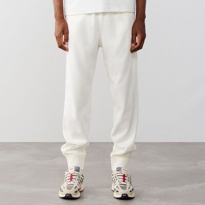 Nike Pant Jogger Club Ft beige/noir xs homme - Publicité Nike Pant Jogger Club Ft beige/noir xs homme - Publicité