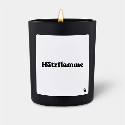 Chatty Candles, Bougie parfumée, Bougie parfumée noire Woody Hätzflamme - Publicité Chatty Candles, Bougie parfumée, Bougie parfumée noire Woody Hätzflamme - Publicité