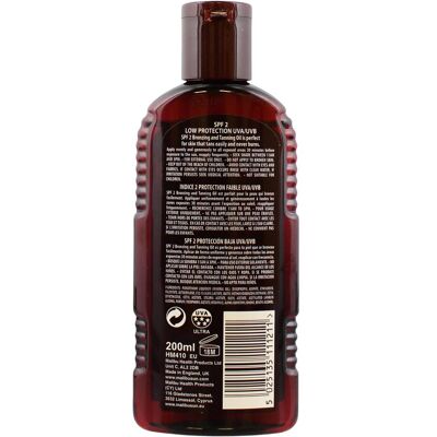 Huile Bronzante Malibu SPF 2 Noix de Coco Tropicale (200ml) - Publicité Huile Bronzante Malibu SPF 2 Noix de Coco Tropicale (200ml) - Publicité