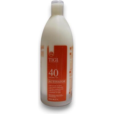 Tigi, Coloration pour cheveux, Colour Activator 12% 40 Vol - Publicité Tigi, Coloration pour cheveux, Colour Activator 12% 40 Vol - Publicité