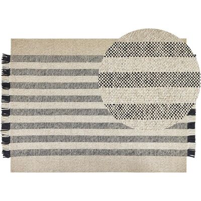 Tapis en laine blanc cassé et noir Beliani - Tapis rectangulaire - Publicité Tapis en laine blanc cassé et noir Beliani - Tapis rectangulaire - Publicité