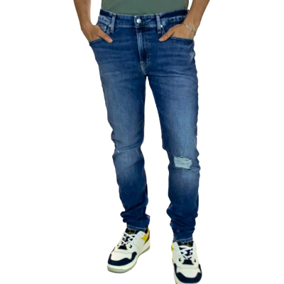 Jeans Calvin Klein Slim taper Homme Jeans 28/32 - Publicité Jeans Calvin Klein Slim taper Homme Jeans 28/32 - Publicité