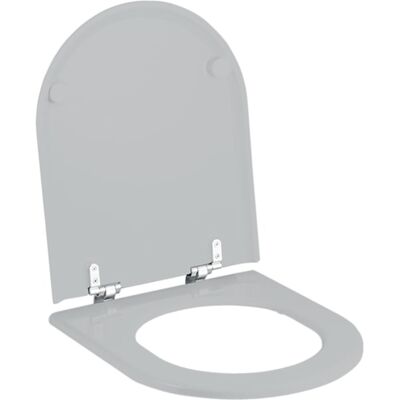 Couvercle de WC Geberit Manhattan avec charnières chromées - Publicité Couvercle de WC Geberit Manhattan avec charnières chromées - Publicité