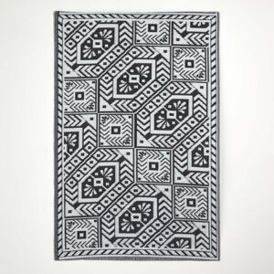 Tapis d'extérieur noir et blanc Homescapes - Design géométrique résistant aux intempéries - Publicité Tapis d'extérieur noir et blanc Homescapes - Design géométrique résistant aux intempéries - Publicité