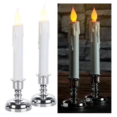 Britesta : Set de 2 bougies LED effet flamme vacillante avec chandeliers - Publicité Britesta : Set de 2 bougies LED effet flamme vacillante avec chandeliers - Publicité