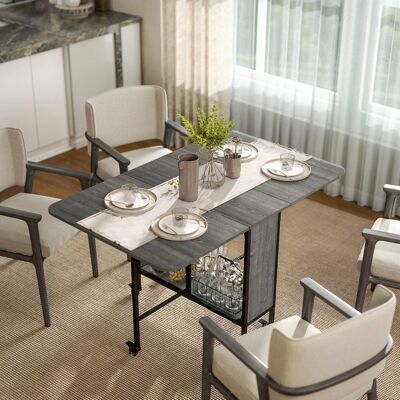 Generic Table pliante de cuisine extensible salle à manger sur roulettes jusquà 6 personnes étagère intégrée 6 roues Gris Gris - Publicité Generic Table pliante de cuisine extensible salle à manger sur roulettes jusquà 6 personnes étagère intégrée 6 roues Gris Gris - Publicité