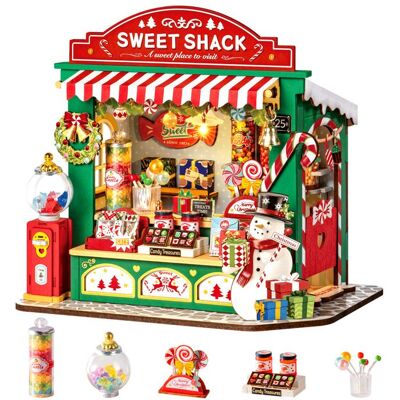Puzzle 3D en bois à construire - ROBOTIME Kit de maison miniature à monter soi-même pour un présentoir à bonbons de Noël - Publicité Puzzle 3D en bois à construire - ROBOTIME Kit de maison miniature à monter soi-même pour un présentoir à bonbons de Noël - Publicité