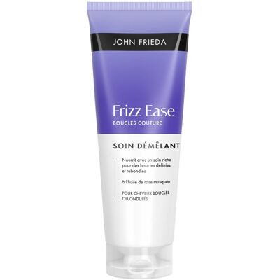 Soin démêlant boucles couture Frizz Ease - John Frieda - Publicité Soin démêlant boucles couture Frizz Ease - John Frieda - Publicité
