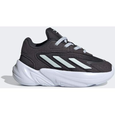 Adidas Chaussure Ozelia Carbon / Cloud White / Halo Blue 22 - Publicité Adidas Chaussure Ozelia Carbon / Cloud White / Halo Blue 22 - Publicité