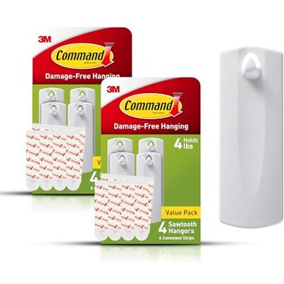 Command Crochets muraux en dents de scie pour accrocher des cadres en dents de scie dans les espaces de vie, 8 cintres blancs et 16 bandes - Publicité Command Crochets muraux en dents de scie pour accrocher des cadres en dents de scie dans les espaces de vie, 8 cintres blancs et 16 bandes - Publicité
