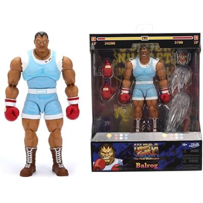 Jada Street Fighter 9335741314R00 Figurine d'action à Collectionner 17 cm articulée avec Accessoires interchangeables - Publicité Jada Street Fighter 9335741314R00 Figurine d'action à Collectionner 17 cm articulée avec Accessoires interchangeables - Publicité