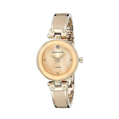 Anne Klein Women's Genuine Diamond Dial Bangle Watch - Publicité Anne Klein Women's Genuine Diamond Dial Bangle Watch - Publicité