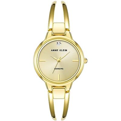 Anne Klein Women's Genuine Diamond Dial Bangle Watch - Publicité Anne Klein Women's Genuine Diamond Dial Bangle Watch - Publicité