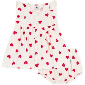 Petit Bateau Robe bébé en coton avec son bloomer, imprimés cœurs - Publicité Petit Bateau Robe bébé en coton avec son bloomer, imprimés cœurs - Publicité