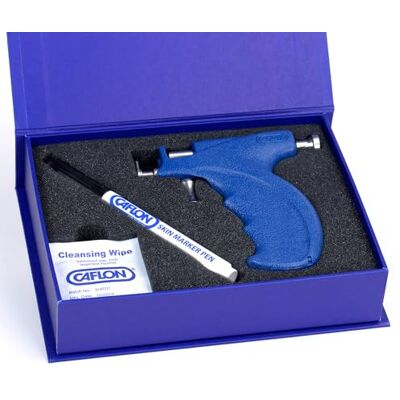 Caflon Blu Piercing Pistolet Instrument et Étui - Publicité Caflon Blu Piercing Pistolet Instrument et Étui - Publicité