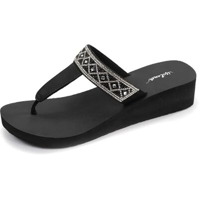 Isotoner Tongs femme à talon de 4cm ultra confortables, 39, noir - Publicité Isotoner Tongs femme à talon de 4cm ultra confortables, 39, noir - Publicité