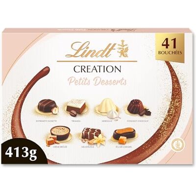 Lindt Boîte CRÉATION Petits Desserts Assortiment de Chocolats au Lait, Noirs et Blancs Inspiration pâtissière Idéal pour Noël, 413g - Publicité Lindt Boîte CRÉATION Petits Desserts Assortiment de Chocolats au Lait, Noirs et Blancs Inspiration pâtissière Idéal pour Noël, 413g - Publicité