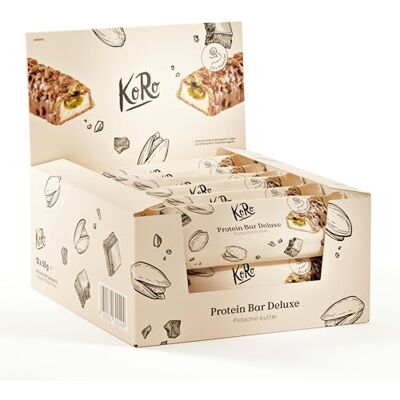 KoRo Barre protéinée Grand Deluxe Pistache 12 x 55g Garniture noisettes et purée de pistache Enrobage chocolat En-cas riche en protéines : 14 g de protéines/barre Alternative barres muesli - Publicité KoRo Barre protéinée Grand Deluxe Pistache 12 x 55g Garniture noisettes et purée de pistache Enrobage chocolat En-cas riche en protéines : 14 g de protéines/barre Alternative barres muesli - Publicité