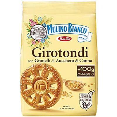 Mulino Bianco , Girotondi, saupoudrés de grains de sucre de canne ambrés et réalisés à base de farine issue de l'agriculture durable 1 paquet de 350 g - Publicité Mulino Bianco , Girotondi, saupoudrés de grains de sucre de canne ambrés et réalisés à base de farine issue de l'agriculture durable 1 paquet de 350 g - Publicité