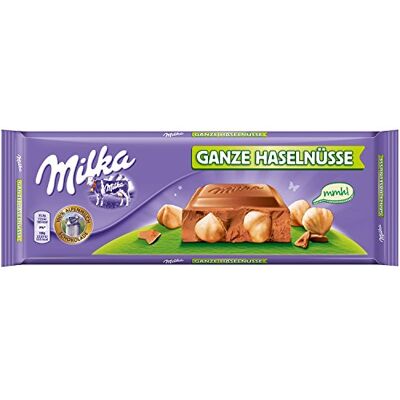Milka Ganze Haselnüsse Noisettes Entières 270g - Publicité Milka Ganze Haselnüsse Noisettes Entières 270g - Publicité