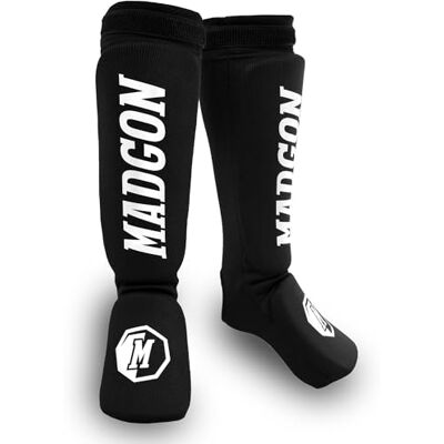 MADGON Protège Tibias Boxe à Ajustement Parfait et Rembourrage Optimal – Protège Tibia Minimisant la Transpiration Protège Tibia Boxe Thaï, et pour Arts Martiaux, MMA, Kickboxing avec Pochette - Publicité MADGON Protège Tibias Boxe à Ajustement Parfait et Rembourrage Optimal – Protège Tibia Minimisant la Transpiration Protège Tibia Boxe Thaï, et pour Arts Martiaux, MMA, Kickboxing avec Pochette - Publicité