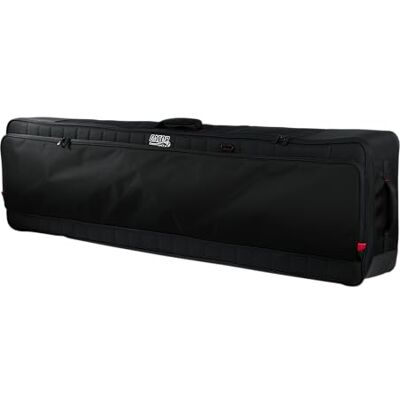 Gator Cases Keyboard Softcase für extra Lange 88-Tasten Keyboards, ultradick gepolstert, Stabiler Tragegriff, Rucksackgurte, Regenhülle, schwarz (G-PG-88SLIMXL) Gator Cases Keyboard Softcase für extra Lange 88-Tasten Keyboards, ultradick gepolstert, Stabiler Tragegriff, Rucksackgurte, Regenhülle, schwarz (G-PG-88SLIMXL)
