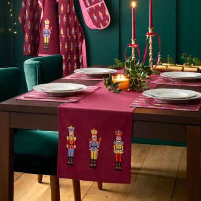 Catherine Lansfield Christmas Nutcracker 32x220cm Dining Table Runner Plum Catherine Lansfield Christmas Nutcracker 32x220cm Dining Table Runner Plum