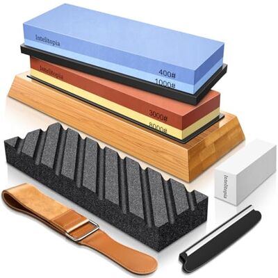 Intelitopia Complete Knife Sharpening Stone Set – Dual Grit Whetstone 400/1000 3000/8000 Knife Sharpener with Leather Strop, Flattening Stone, Bamboo Base, 3 Non-Slip Rubber Bases & Angle Guide Intelitopia Complete Knife Sharpening Stone Set – Dual Grit Whetstone 400/1000 3000/8000 Knife Sharpener with Leather Strop, Flattening Stone, Bamboo Base, 3 Non-Slip Rubber Bases & Angle Guide