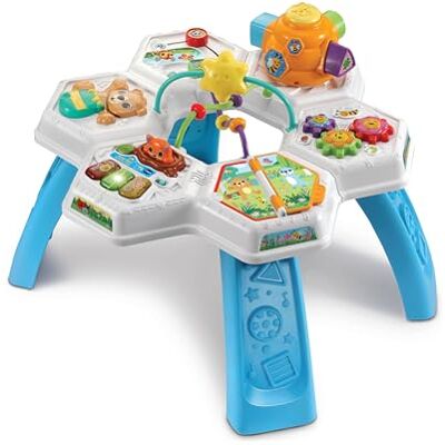 VTech Baby Busy Bee Activity Table, English 2-in-1 table with 6 play zones, piano keys, storybook, animal maze, gears and beehive shape sorter. Ages 6-36 months VTech Baby Busy Bee Activity Table, English 2-in-1 table with 6 play zones, piano keys, storybook, animal maze, gears and beehive shape sorter. Ages 6-36 months