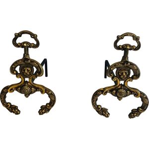 Anonyme Coppia di candelabri d'epoca in bronzo e ferro battuto con teste di leone, 190