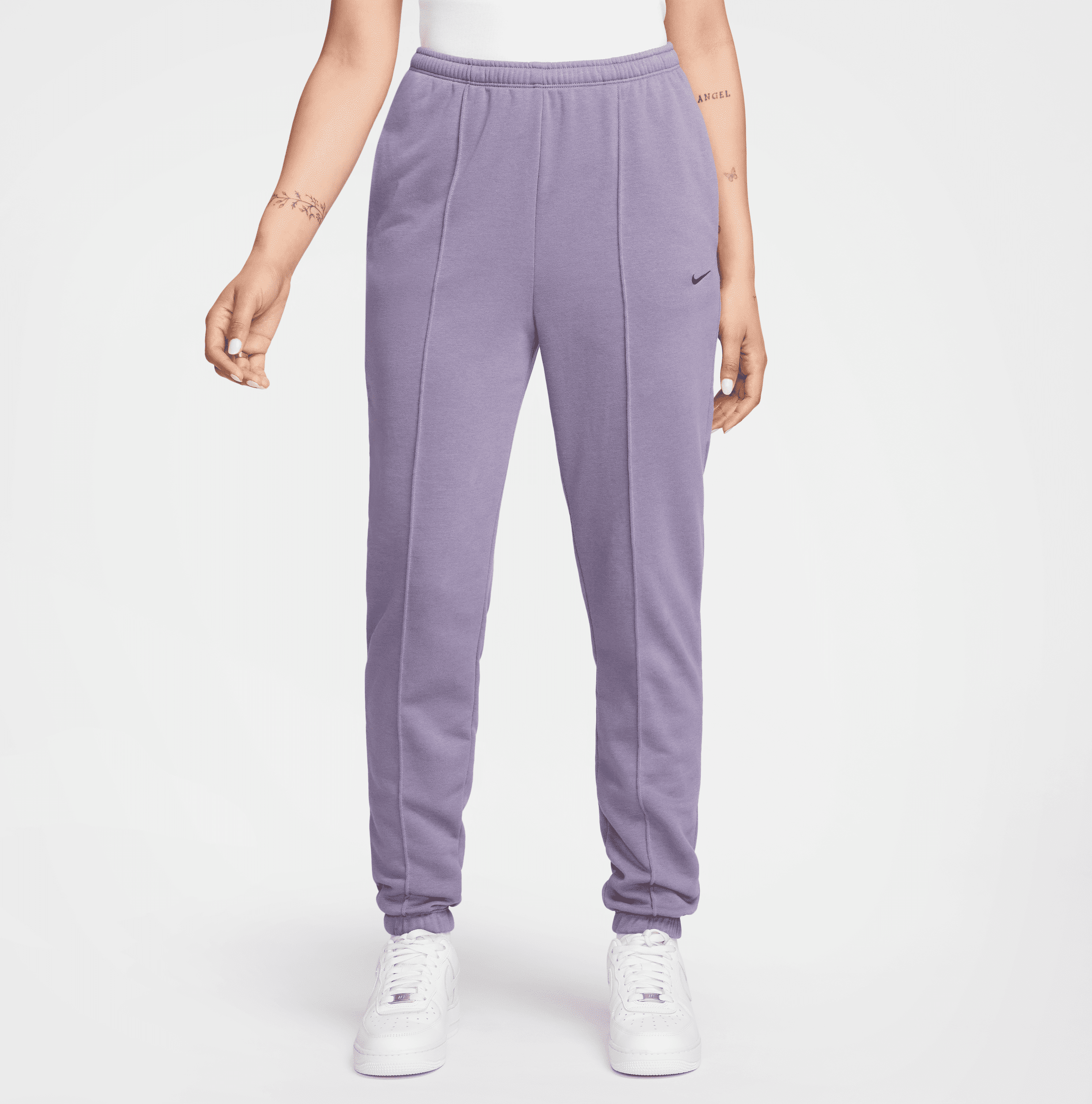 nike pantaloni tuta slim fit in french terry a vita alta  sportswear chill terry – donna - viola