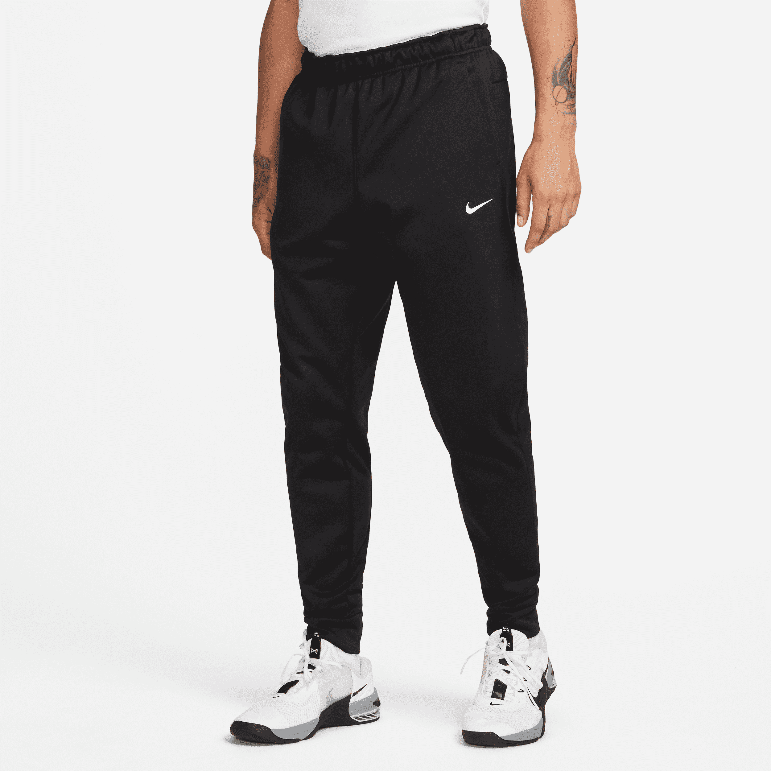 nike pantaloni fitness affusolati therma-fit  therma – uomo - nero