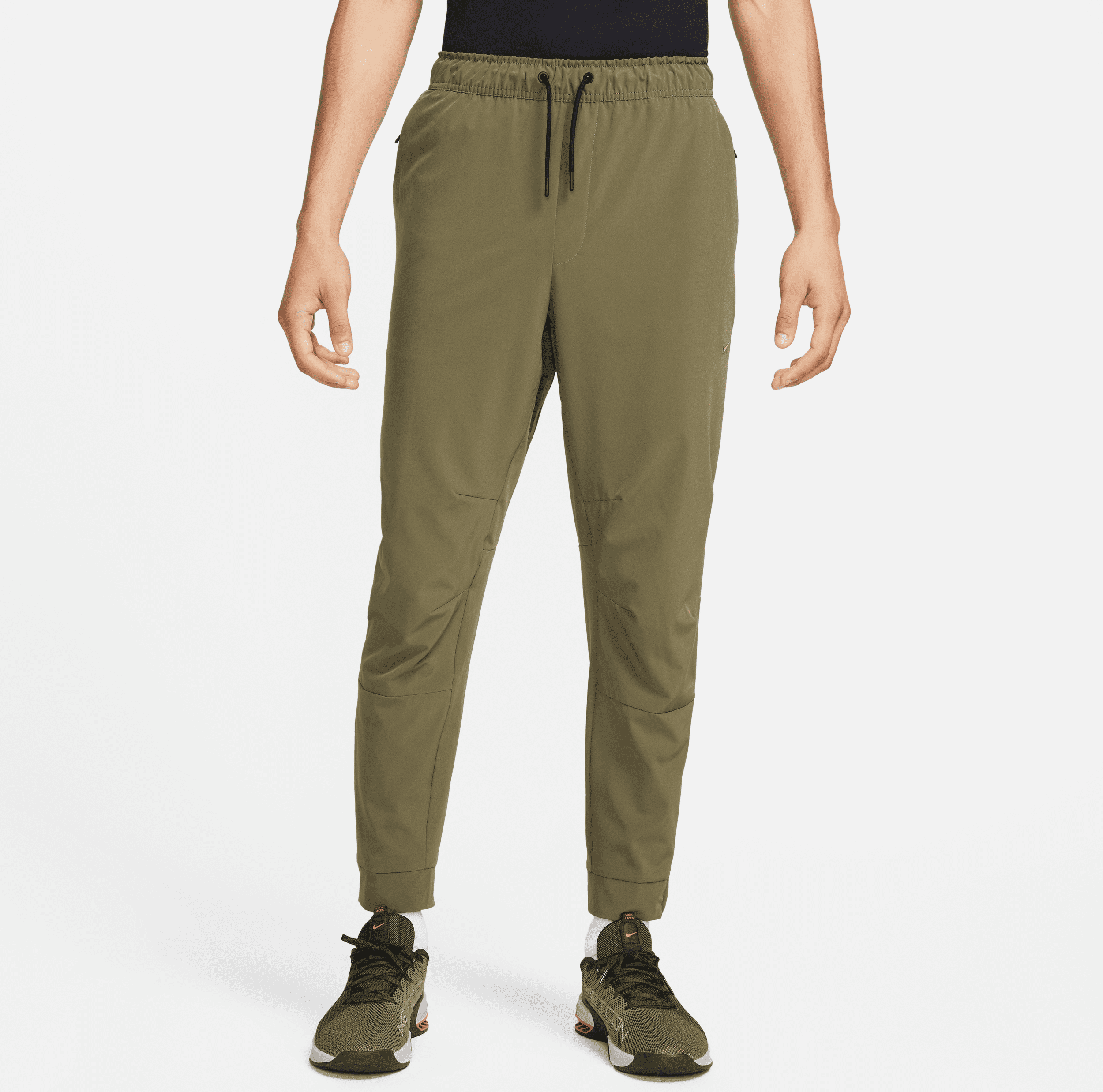 nike pantaloni versatili con zip sul bordo dri-fit  unlimited – uomo - verde