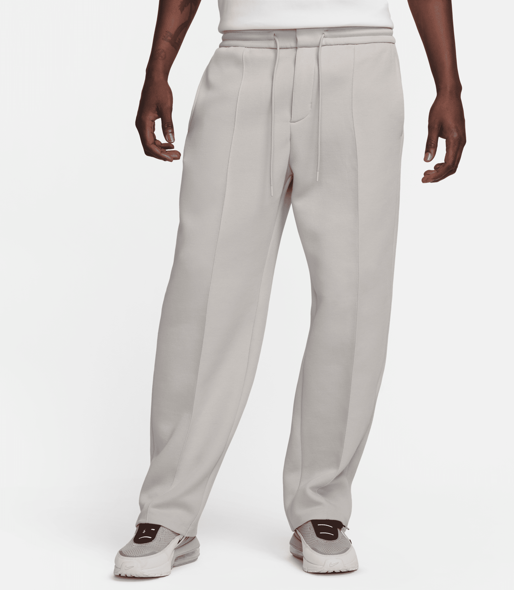 nike pantaloni tuta loose fit con orlo aperto  sportswear tech fleece reimagined – uomo - grigio