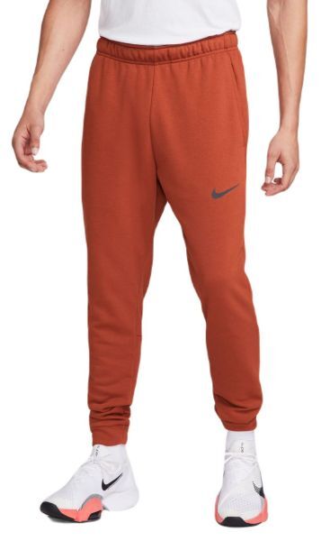 Nike Pantaloni da tennis da uomo Dri-Fit Pant Taper rugged orange/black S
