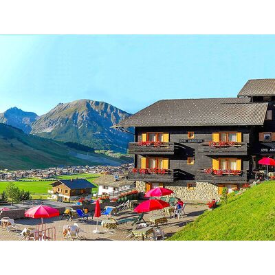 Smartbox Due cuori a Livigno: 1 notte in camera Romantic con pausa relax, aperitivo e cena di 3 portate Smartbox Due cuori a Livigno: 1 notte in camera Romantic con pausa relax, aperitivo e cena di 3 portate