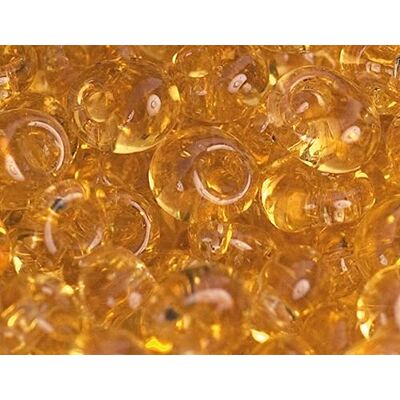 TOHO Perline giapponesi magatama trasparente oro 3 mm. 100 g. TOHO Perline giapponesi magatama trasparente oro 3 mm. 100 g.