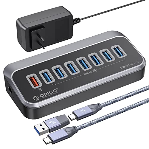 ORICO Hub USB,  Sdoppiatore USB, Hub USB C a 7 porte di 5 Gbps trasferimento dati ad alta velocità e una porta di ricarica intelligente, 0.5m cavo, Multi USB Adattatore per MacBook, Mac Pro/Mini