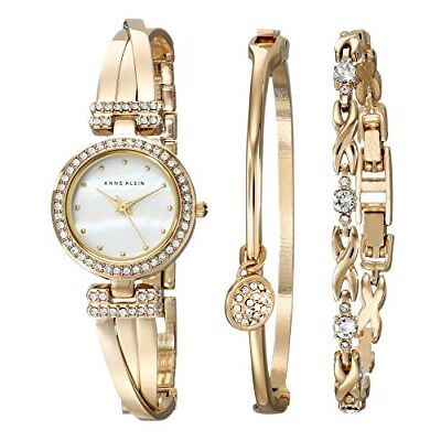Anne Klein Set con orologio da donna a bracciale rigido impreziosito da cristalli di alta qualità e bracciale, Oro Anne Klein Set con orologio da donna a bracciale rigido impreziosito da cristalli di alta qualità e bracciale, Oro