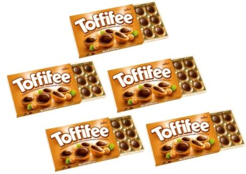 Generico Storck®   Toffifee® Cioccolatini Nocciole Intere Ricoperte Caramello e Crema Nocciole e Cioccolato   Nocciole Ricoperte Cioccolato 5 Confezioni x 125 Gr