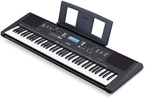 Yamaha Tastiera portatile   — Tastiera per principianti con sensibilità a 76 battute, include un buono per 2 lezioni di musica online in  Music School, en negro