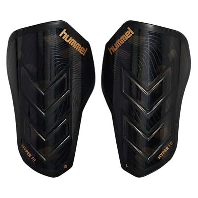 Hummel , hmlSHIN Guards Hyper Fit, trasparente/nero/oro, XS Hummel , hmlSHIN Guards Hyper Fit, trasparente/nero/oro, XS