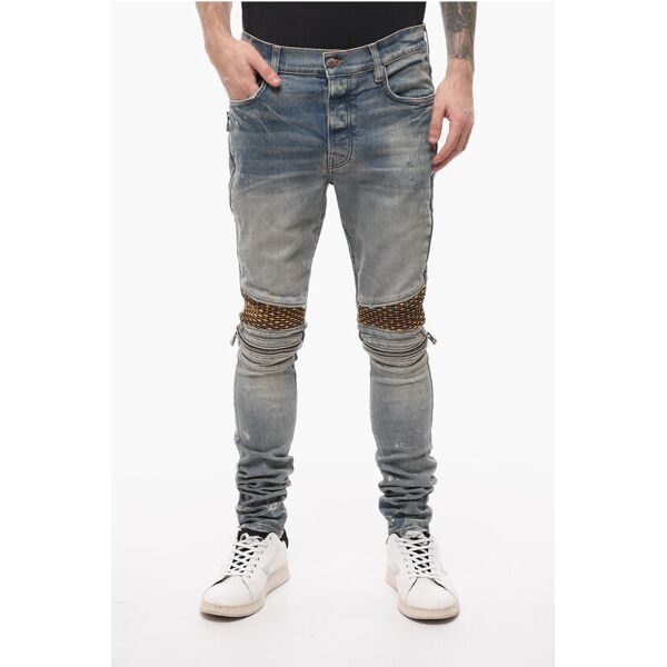 amiri jeans biker in denim effetto vintage con dettagli in velour taglia 30