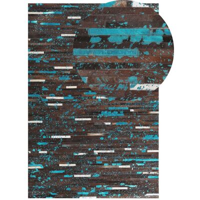 Tappeto in pelle di mucca Beliani - Patchwork marrone e blu 140x200cm Tappeto in pelle di mucca Beliani - Patchwork marrone e blu 140x200cm
