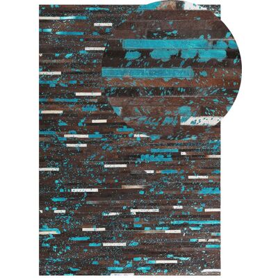 Tappeto in pelle di mucca Beliani - Patchwork marrone e blu 140x200cm Tappeto in pelle di mucca Beliani - Patchwork marrone e blu 140x200cm