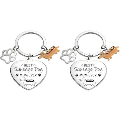 DUINIU Sleutelhanger in de vorm van een teckel, 2-delig, versierd met grappige stijl, licht, draagbaar en eenvoudig op te hangen, verjaardags- en kerstcadeau. DUINIU Sleutelhanger in de vorm van een teckel, 2-delig, versierd met grappige stijl, licht, draagbaar en eenvoudig op te hangen, verjaardags- en kerstcadeau.