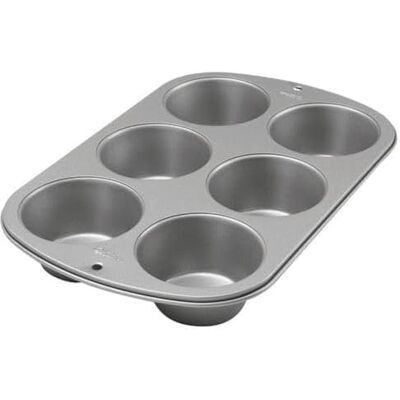 Wilton 03-3119 Jumbo muffinvorm recht recept, antiaanbaklaag, 6 gaten, 7 cm x 24,8 cm x 36,2 cm, staal Wilton 03-3119 Jumbo muffinvorm recht recept, antiaanbaklaag, 6 gaten, 7 cm x 24,8 cm x 36,2 cm, staal