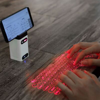 LEING FST M1 Laser Toetsenbord - Draagbaar Mini Virtueel Keyboard LED Projectie Draadloos - Compatibel met PC, Laptop en Smartphone - Wit LEING FST M1 Laser Toetsenbord - Draagbaar Mini Virtueel Keyboard LED Projectie Draadloos - Compatibel met PC, Laptop en Smartphone - Wit