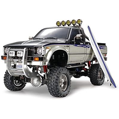 TAMIYA TMYTAM58397 1:10 RC Toyota HiLux HighLift 4 x 4 3 versnellingen op afstand bestuurde auto incl. surfplank offroad pick up -elektromotor modelbouwset metalen versnellingsbak - TAMIYA TMYTAM58397 1:10 RC Toyota HiLux HighLift 4 x 4 3 versnellingen op afstand bestuurde auto incl. surfplank offroad pick up -elektromotor modelbouwset metalen versnellingsbak -